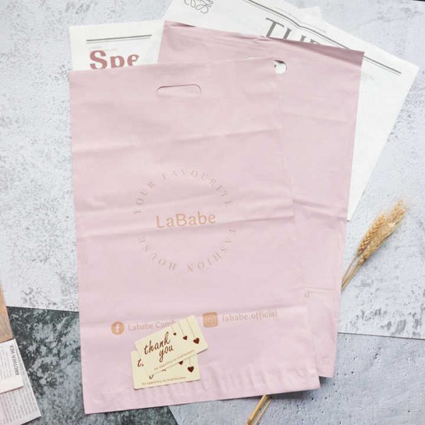 Recycled LDPE Pink poly mailing bag with handle