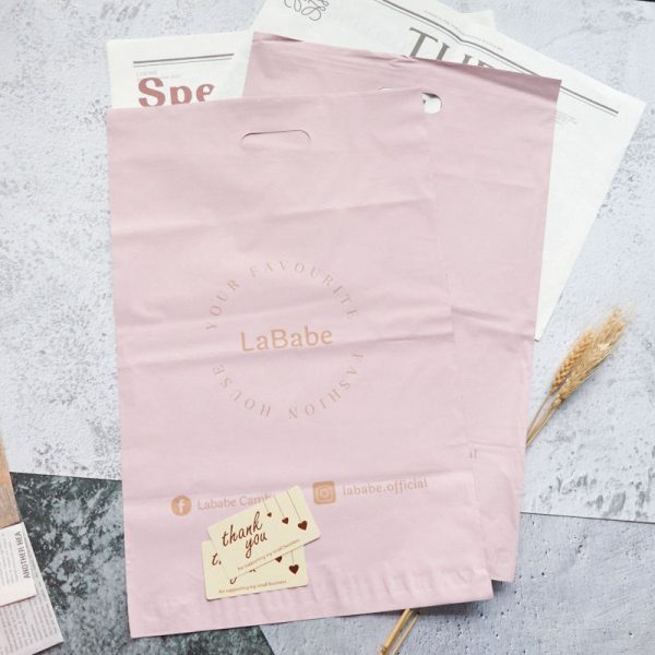 Recycled LDPE Pink poly mailing bag with handle